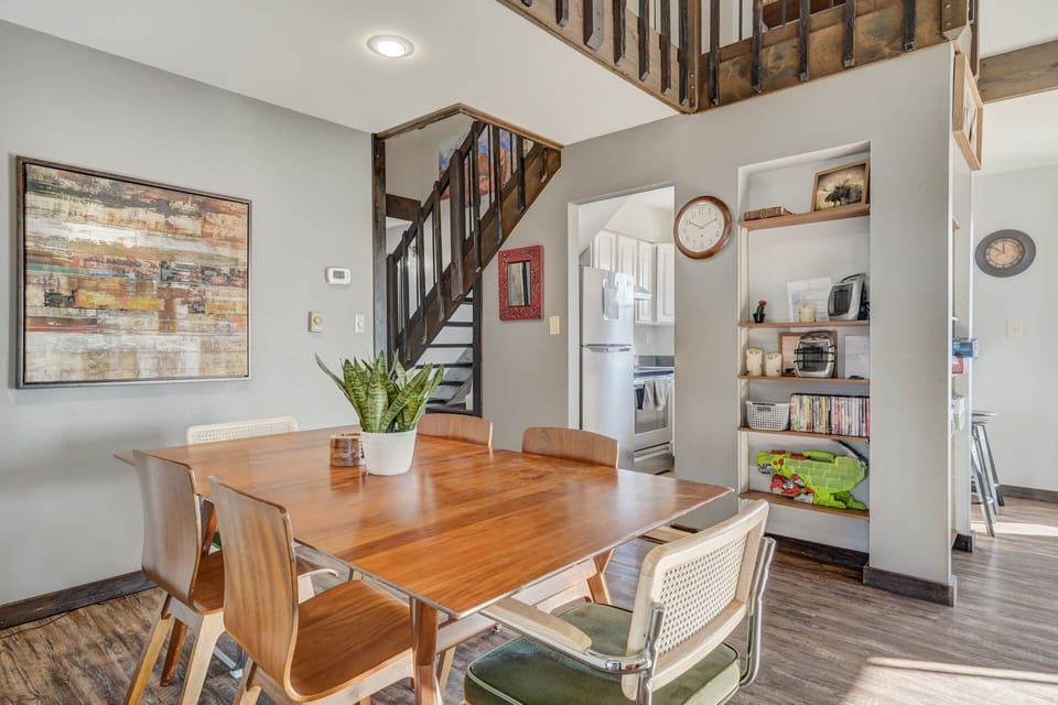 Our modern dining table and wall art give this cabin a refined touch as you enjoy meals together.
