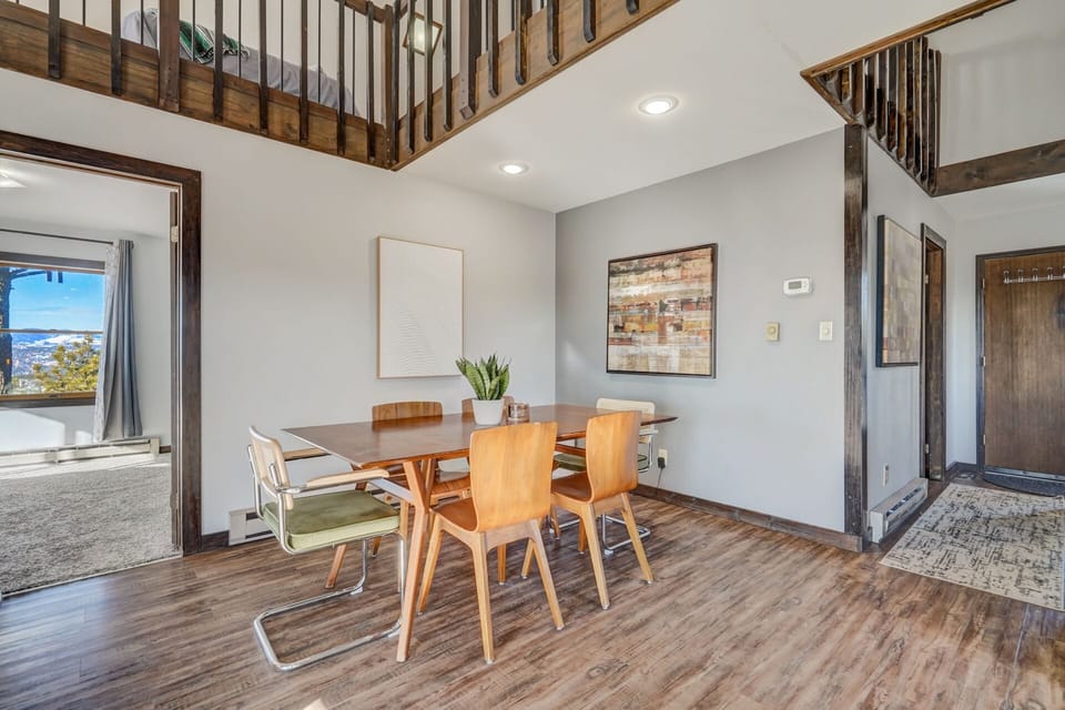 Our modern dining table and wall art give this cabin a refined touch as you enjoy meals together.