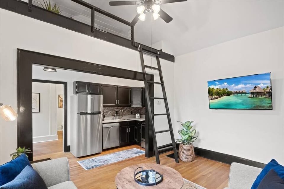 Ladder leads to loft area which is a nice nook for reading or working a puzzle if you have time.
