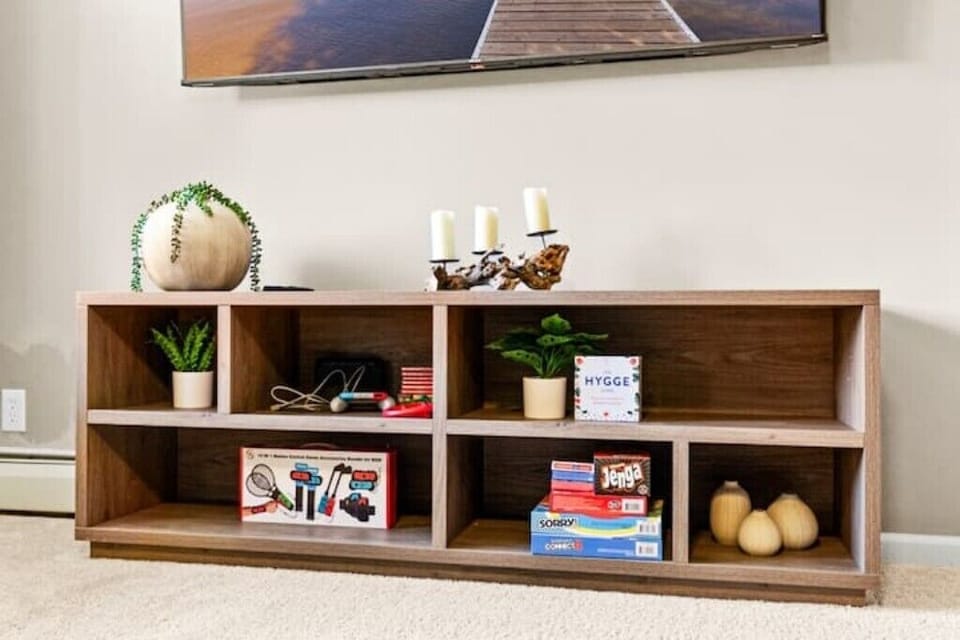 Our theater area boasts a 75'' Smart TV and all the comforts you need