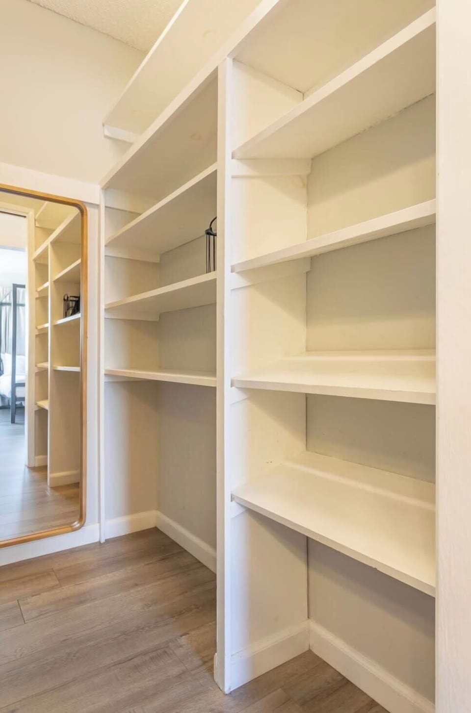 Unwind in this peaceful bedroom retreat, where you can enjoy the ease of a private vanity and a generous walk-in closet designed for your convenience.
