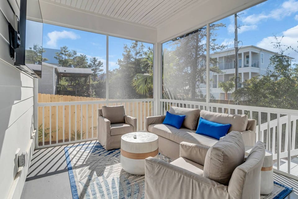 Private screened lanai with sofa, 2 swivel chairs, and tv so you can enjoy the Florida, indoor/outdoor lifestyle during your stay!