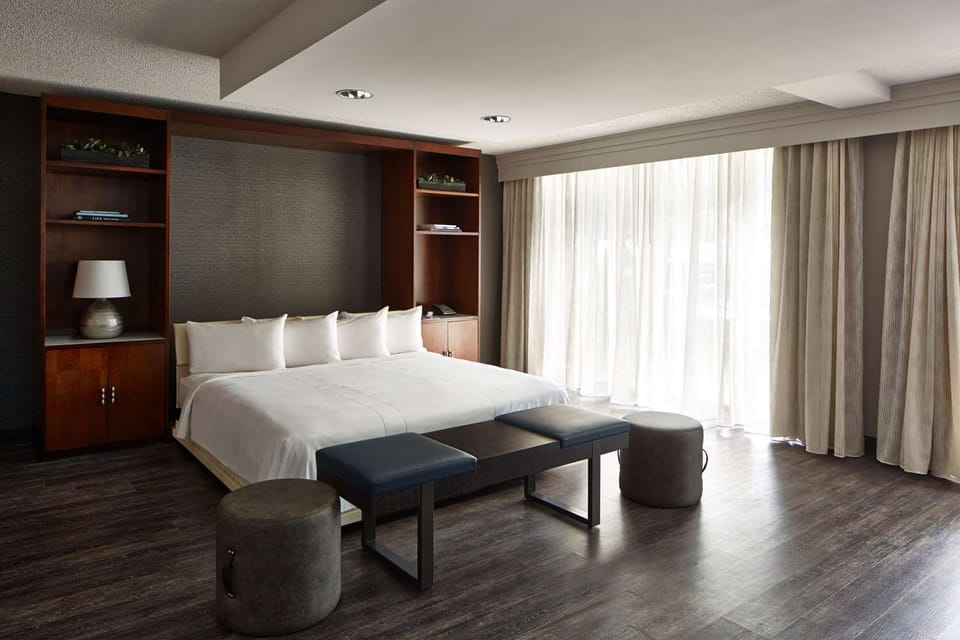 Sink into plush pillows and enjoy calm, modern finishes.
