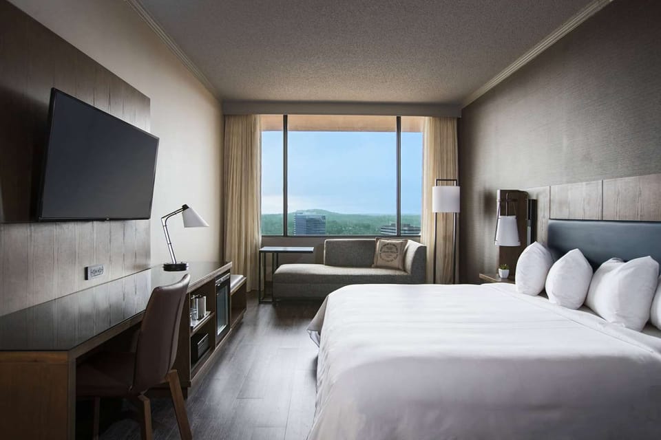 Wake up to serene views from crisp, cloud-soft bedding.