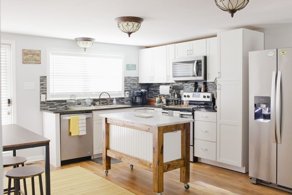 Slide from stove to table in a step — meals and conversation stay in the same easy room.