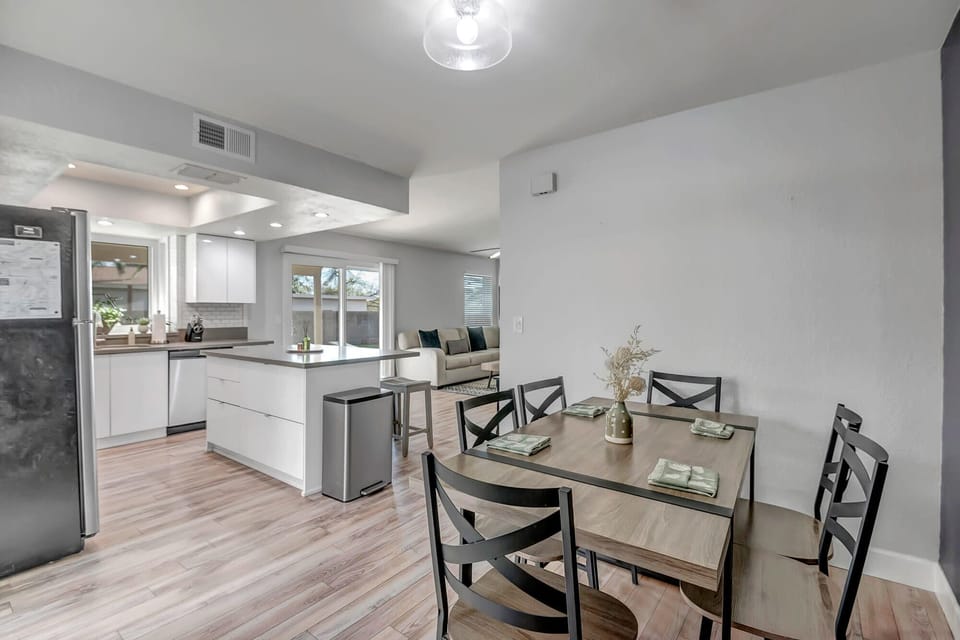"Enjoy delightful meals and lively conversations at our inviting and stylish dining table."