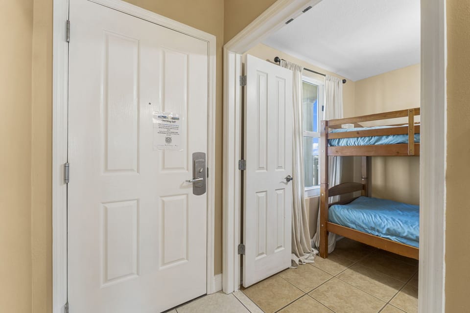 The bunk room, perfect for traveling with children, has its own television.