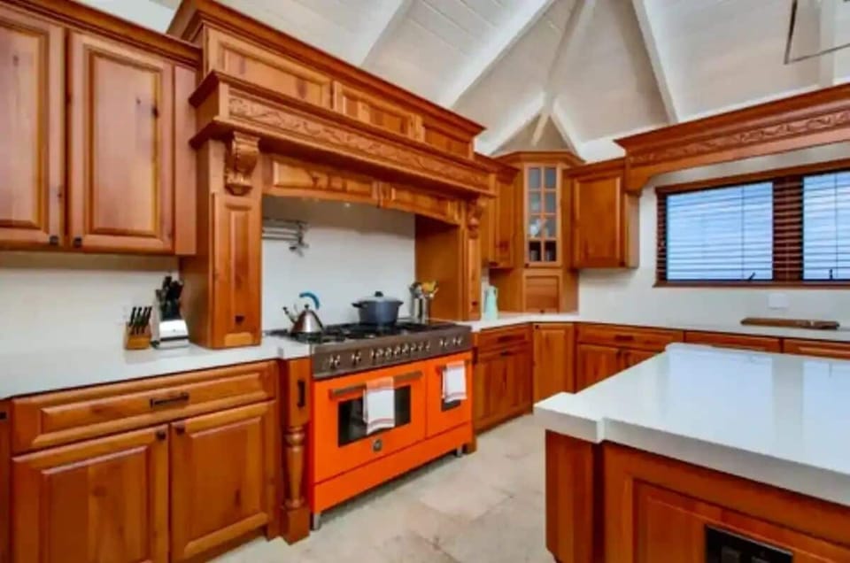 gourmet kitchen, well stocked with utensils and other basic items