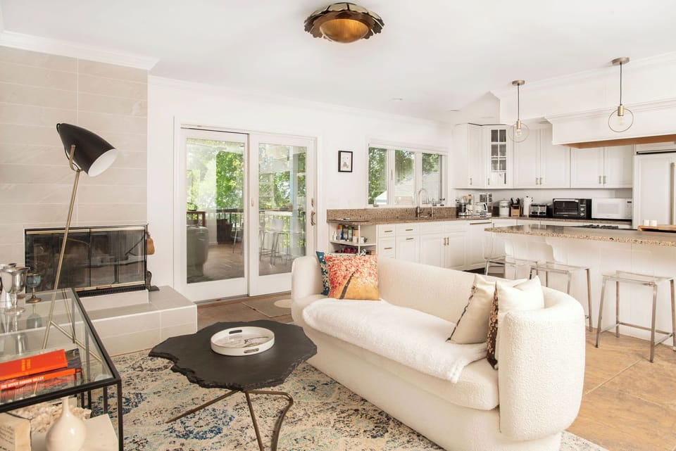 Kitchen and adjacent sitting area.