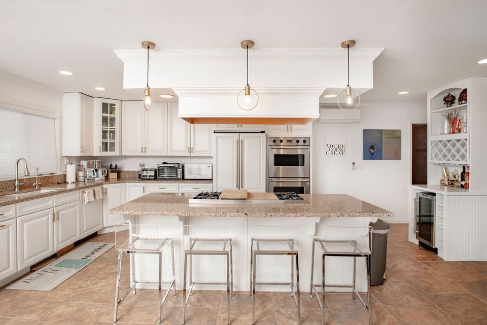 Fully stocked chef's kitchen.