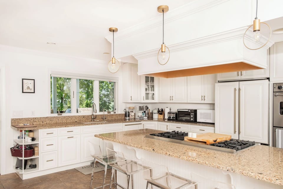 Fully stocked chef's kitchen.