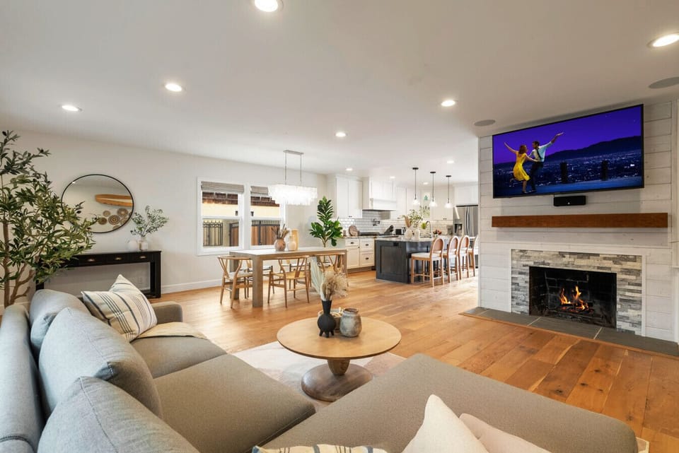 Home is where the heart is, and our living room is the heartbeat. (65 inch TV)