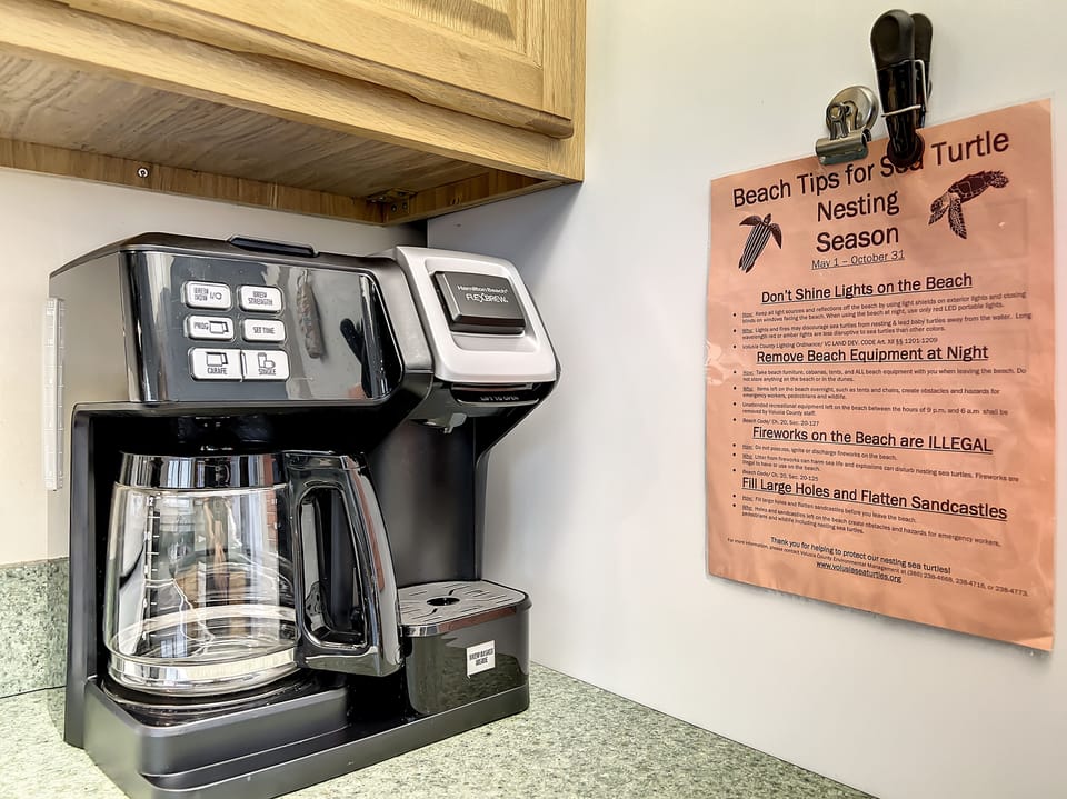 Start your day with a fresh brew from this convenient coffee maker, alongside thoughtful sea turtle nesting tips for an eco-conscious beach stay.