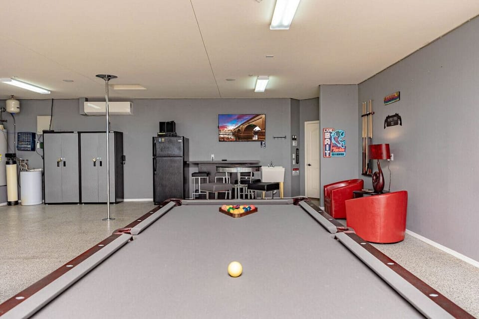 Garage featuring pool table.