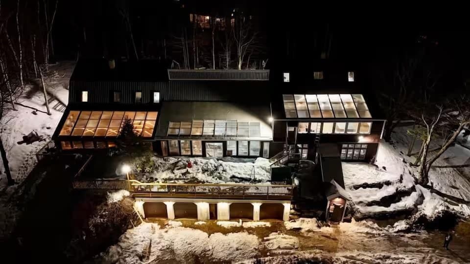 Soak under the stars! The outdoor hot tub offers stunning night views, perfect after a day on the slopes.