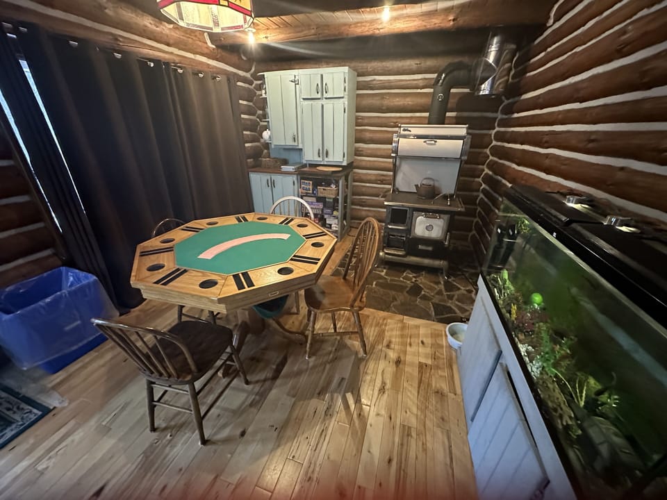 Poker table and many many board games. Table top flips for more eating space.