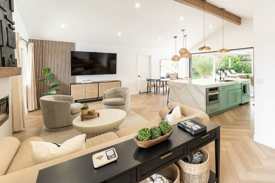 Open living space w/ plush seating, clean lines & a relaxed layout that feels airy and welcoming.