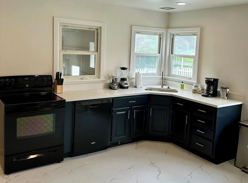 Lovely light-filled kitchen ready for your next fabulous meal.