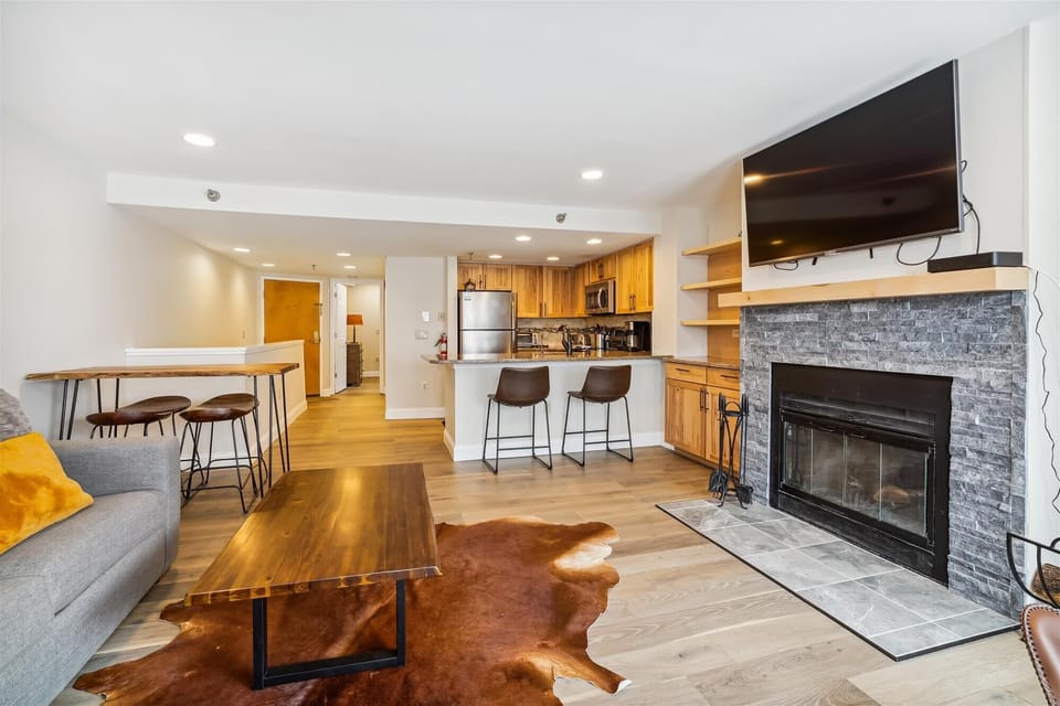 The open layout connects the kitchen, dining, and living spaces for easy entertaining and relaxing.