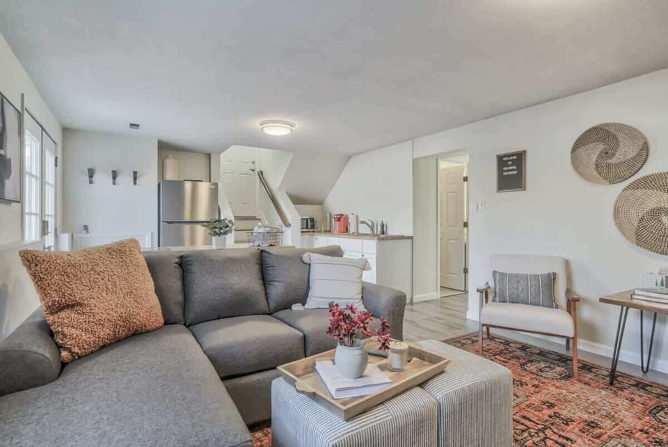 Our living room is the perfect place to kick back and relax, with plenty of seating options and a cozy ambiance that will make you feel right at home.