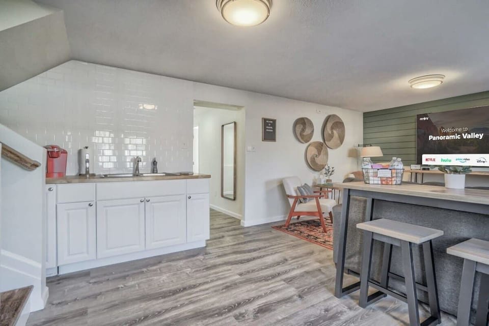 Embrace the Spacious Open Layout! The Kitchenette, Dining Area, and Living Room Flow Seamlessly Together, Offering You Unparalleled Comfort and Convenience.