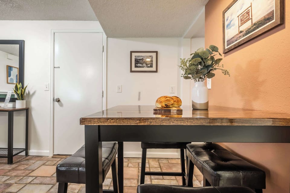 Cozy dining space just off the kitchenette—perfect for sharing a casual meal or morning coffee before a day of exploring Colorado Springs.







