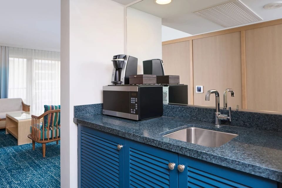 Start mornings with coffee and easy in-room snacks.