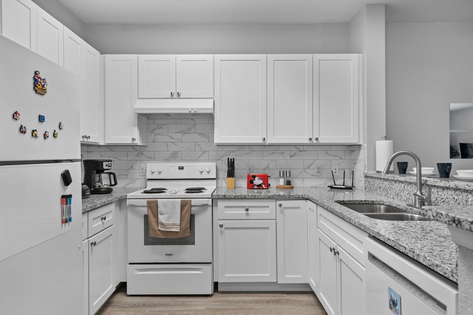 The kitchen has generous space and is fully equipped.