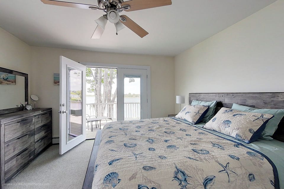 Magical Master King bedroom with French doors to the deck.
