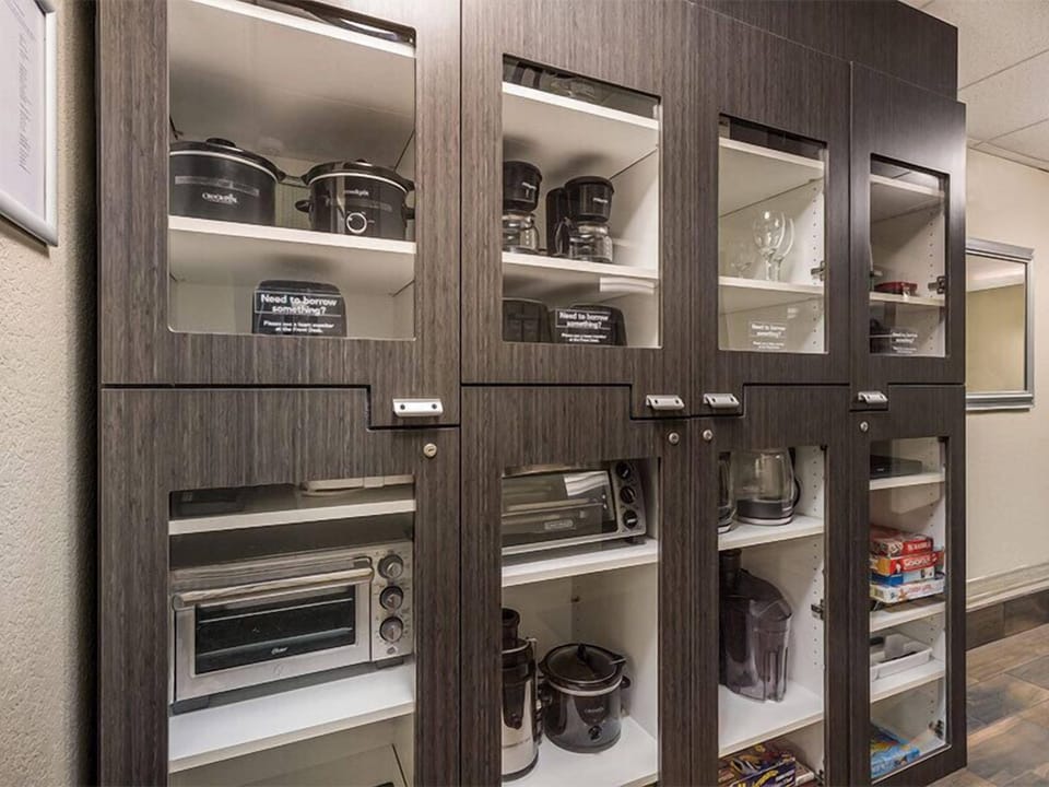 Grab snacks and brew coffee anytime from the guest pantry.