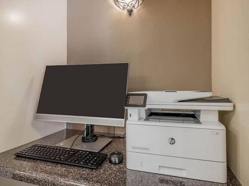 Catch up on emails with a convenient business workstation nearby.