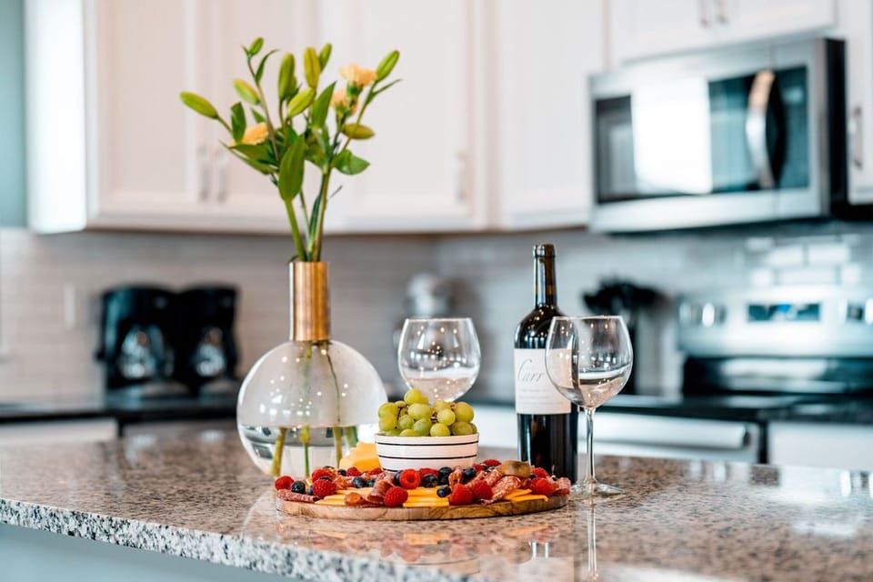 Wine and Charcuterie moments. This enormous, fully-equipped kitchen has ample storage space, and everything you could ever want for the vacation of a lifetime; even muffins tins & cookie sheets so the kid can bake with mom and grandma.