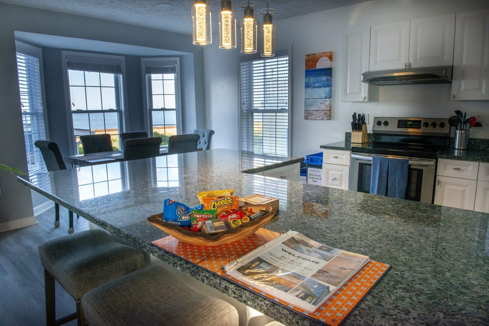 2nd and 3rd floor have identical kitchens w/large island and beach views.