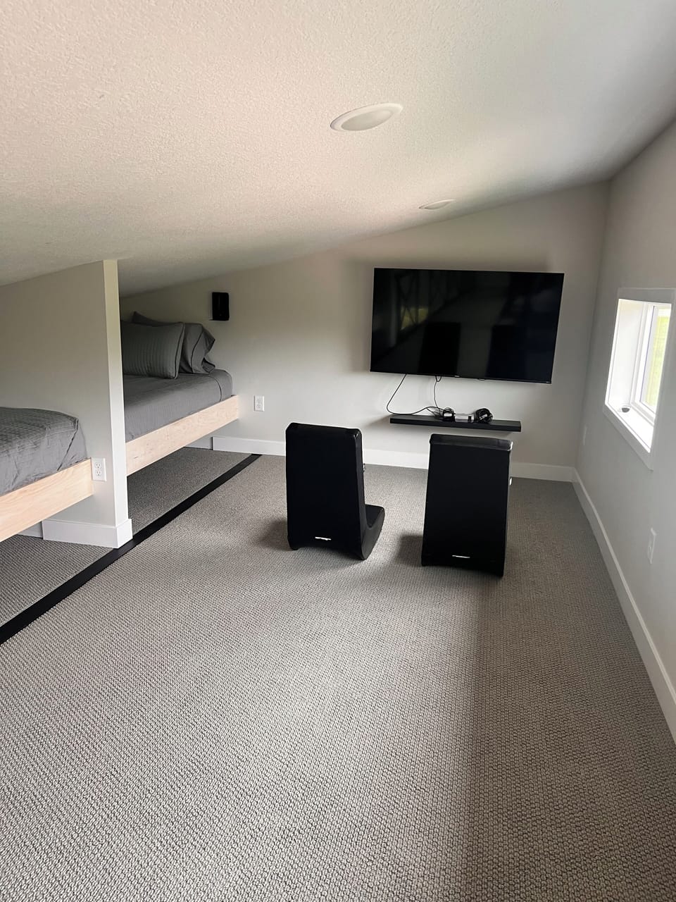 Loft with 2 built in bunks and a Nintendo on each side of the room!