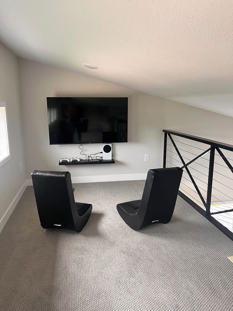 Loft with 2 built in bunks and two tvs with nintendos on each side!