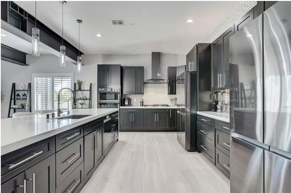 1 of 2 full kitchens. Each kitchen has 2 fridges. 