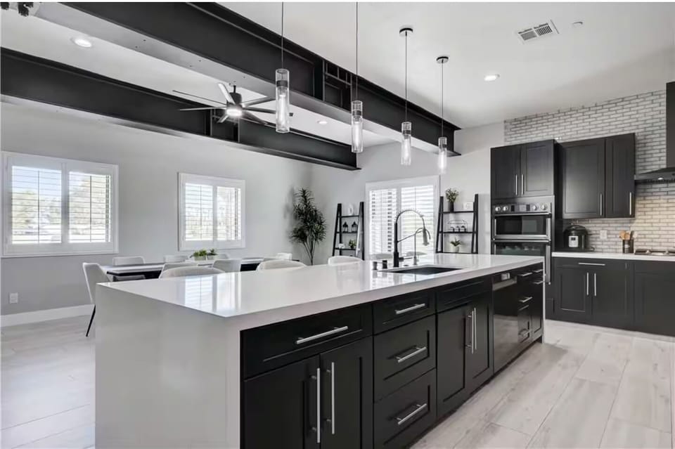 1 of 2 full kitchens. Each kitchen has 2 fridges. 