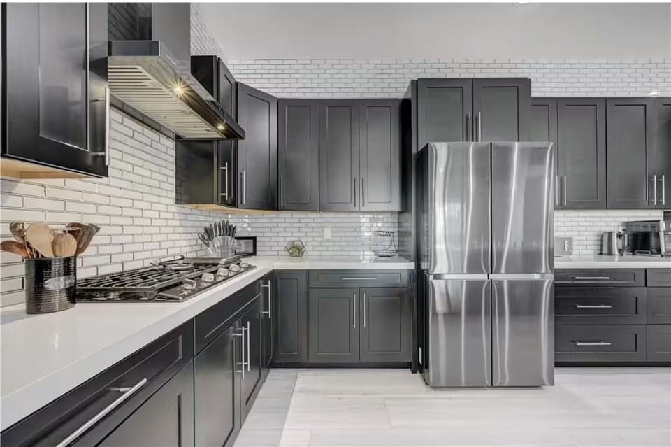 1 of 2 full kitchens. Each kitchen has 2 fridges. 