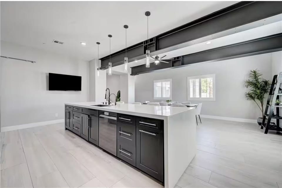 1 of 2 full kitchens. Each kitchen has 2 fridges. 