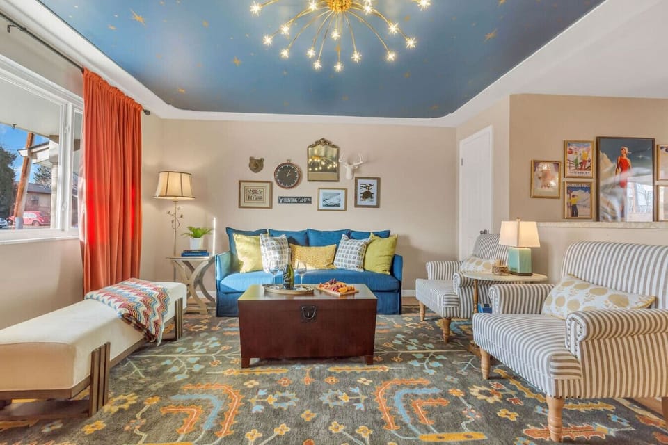 Elegant lounge under a sparkling chandelier.