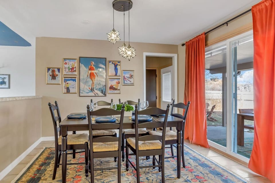 Gather `round the table in the dining area, where seating for six awaits, promising intimate meals and lively conversations in a welcoming atmosphere.