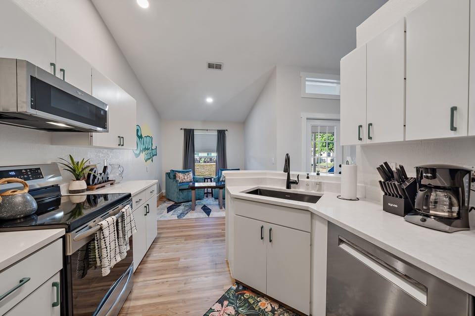 The dining room flows seamlessly into the fully-equipped kitchen!