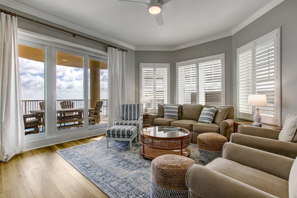 Living Space with Panoramic Views from Private Covered Balcony and Flat-Screen Smart TV