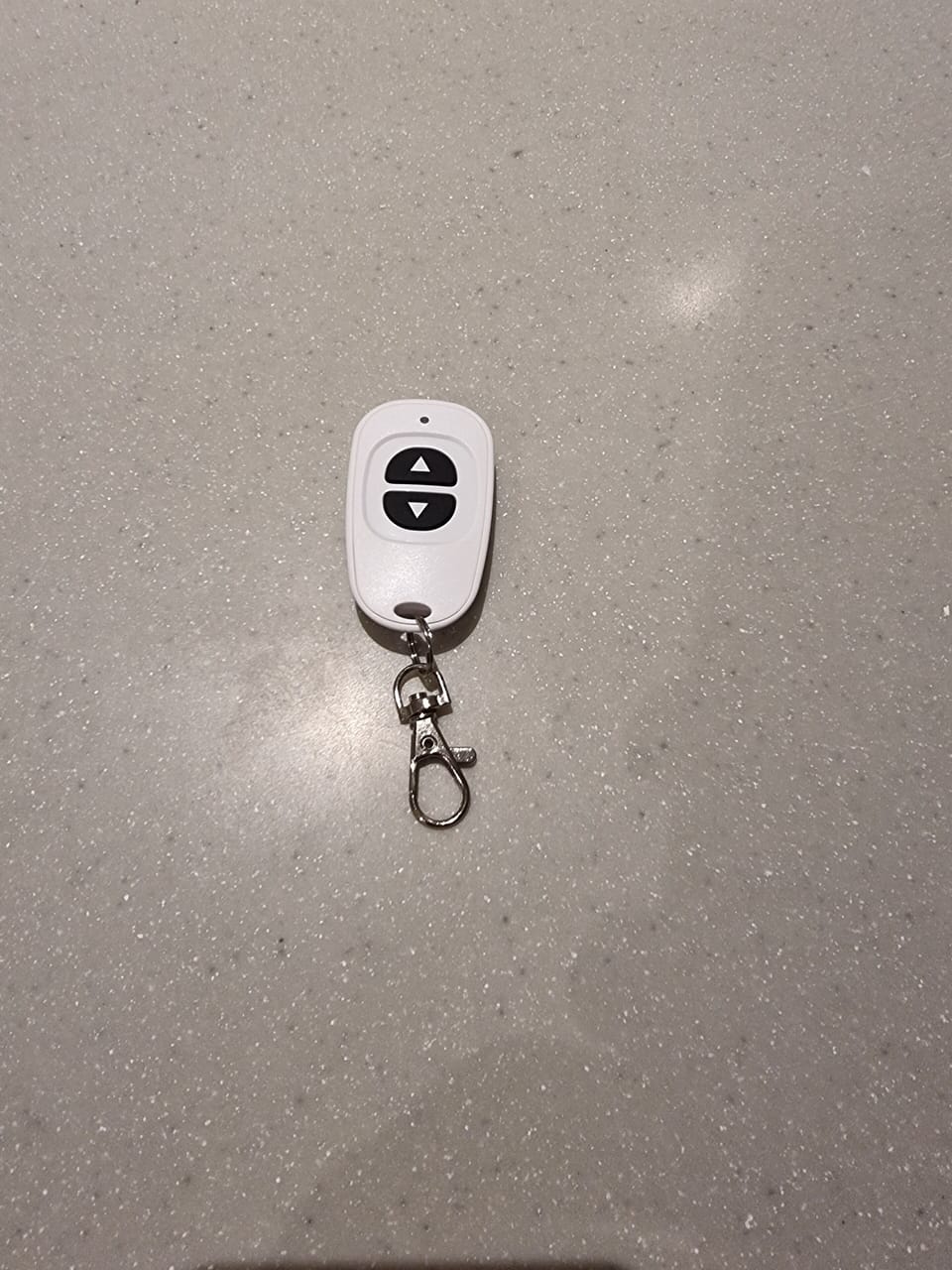 Remote for the parking barrier to prevent others from using your spot