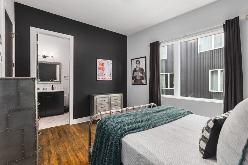 Bedroom #2 with a queen bed, large closet, room-darkening shades, and an ensuite bathroom.