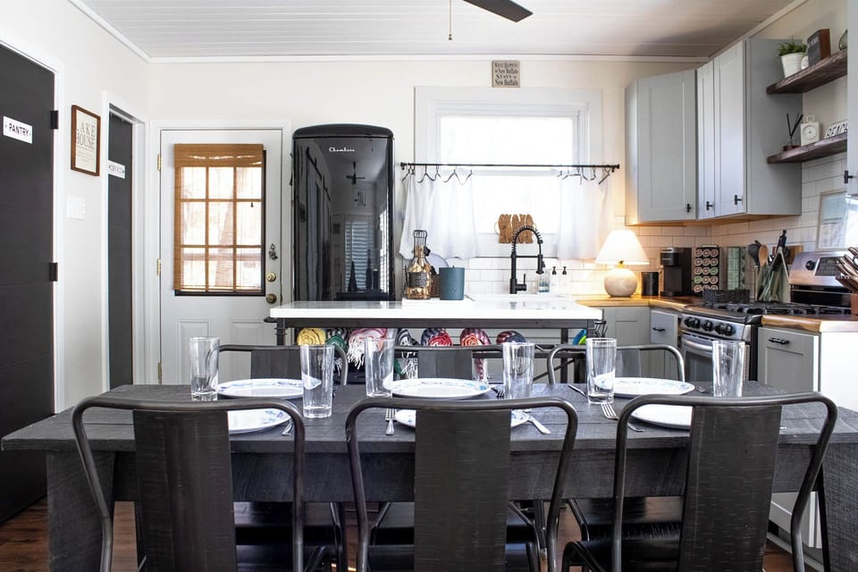 Adorable kitchen with dining space and bar seating