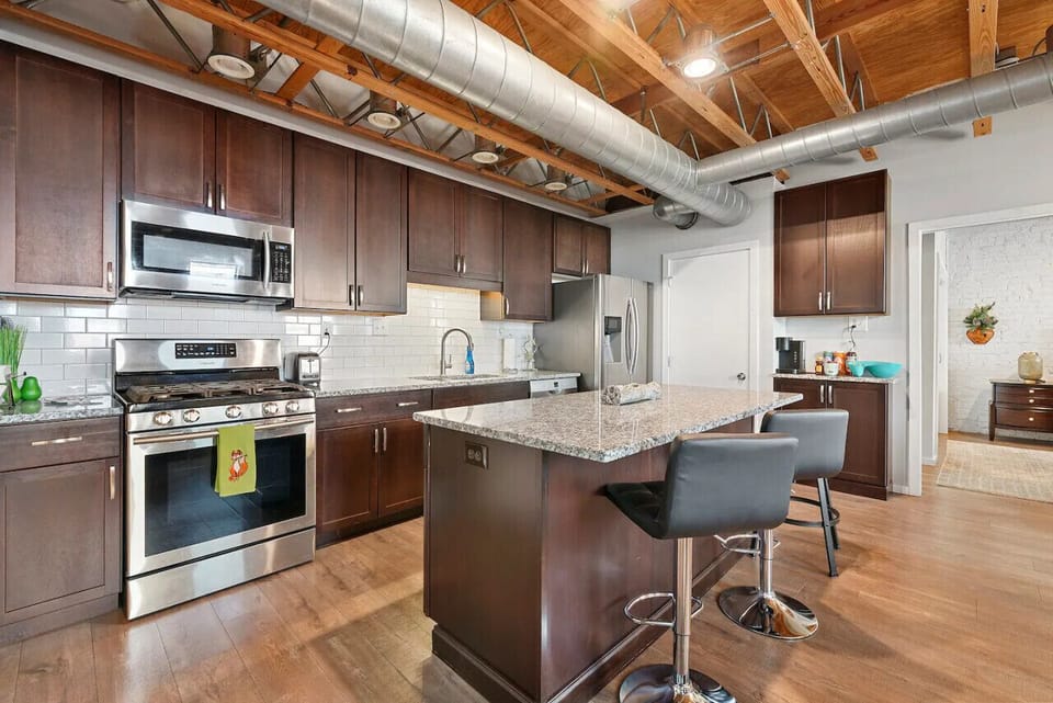 Fully Stocked Kitchen with Dining Bar