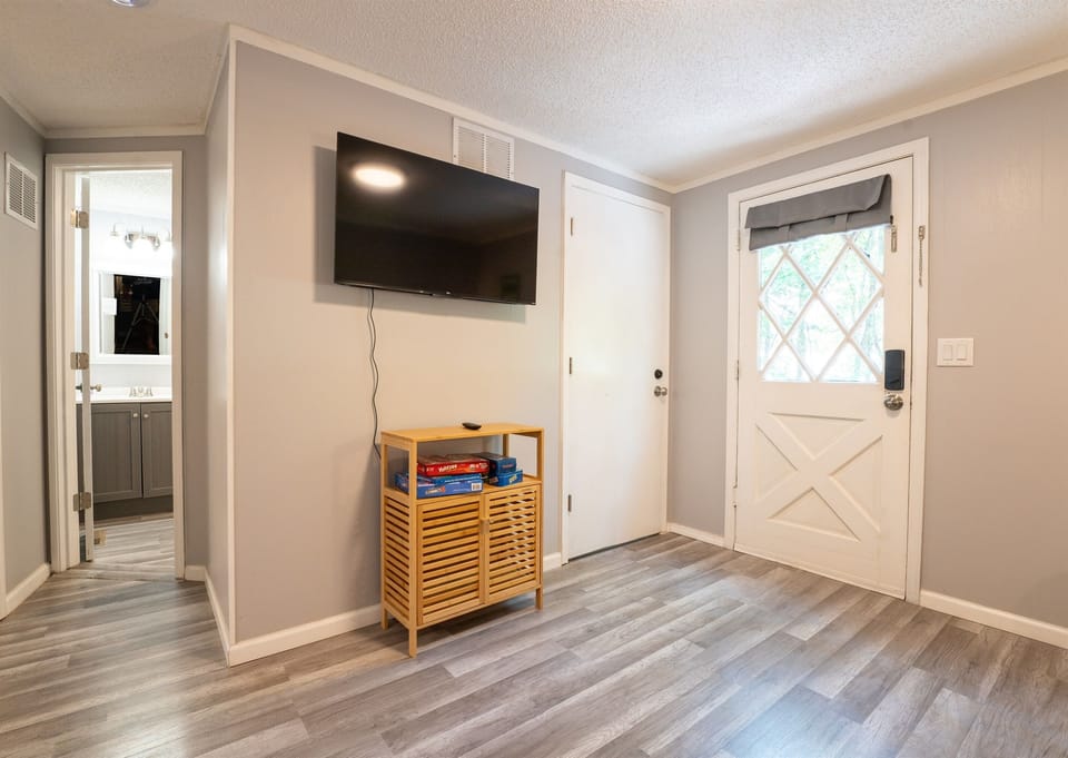 TV upstairs for the kids! (board games in the cabinet)