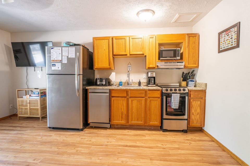Well-stocked kitchen with new appliances