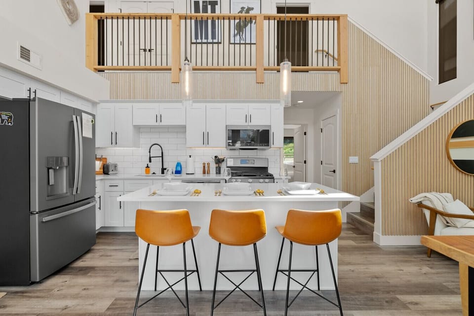 Kitchen & Dining: Stylish space with sleek appliances and inviting seating for memorable meals!